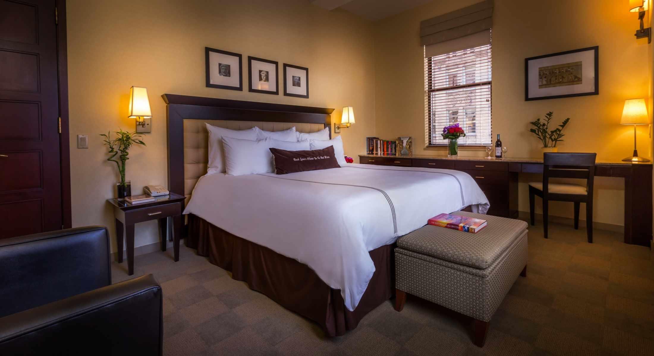 The Mythology Room features a King Bed and a large desk perfect for couples or a long stay.